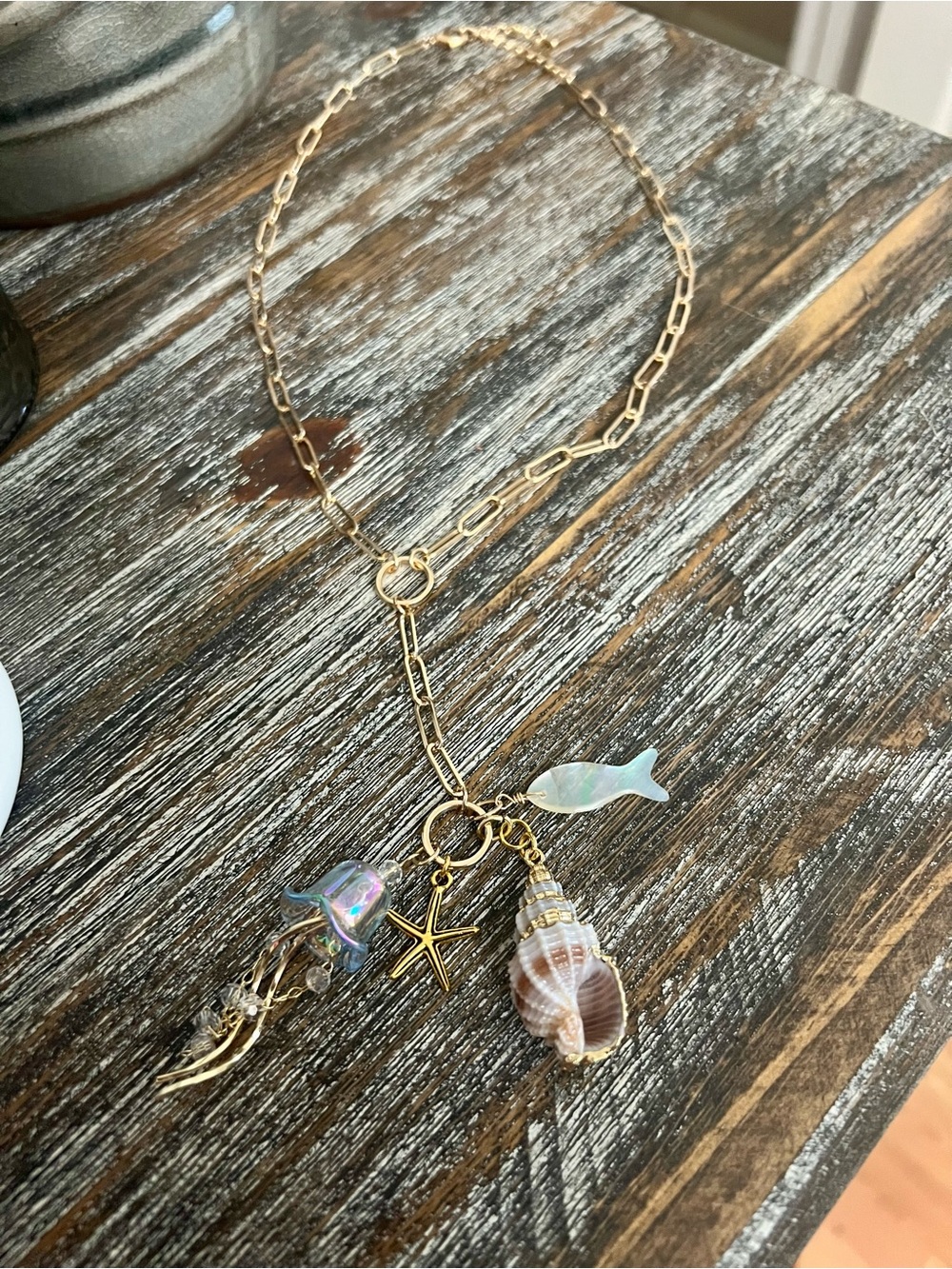 Hand Crafted Gold Lariat Necklace with Iridescent Sea Charms
